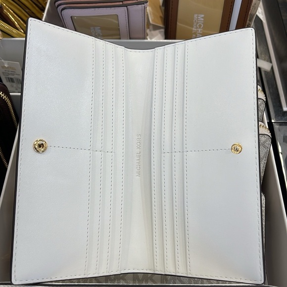 Michael Kors Reed Lg Bifold Pebbled Leather Snap Wallet Card Case
Optic White - Picture 9 of 16